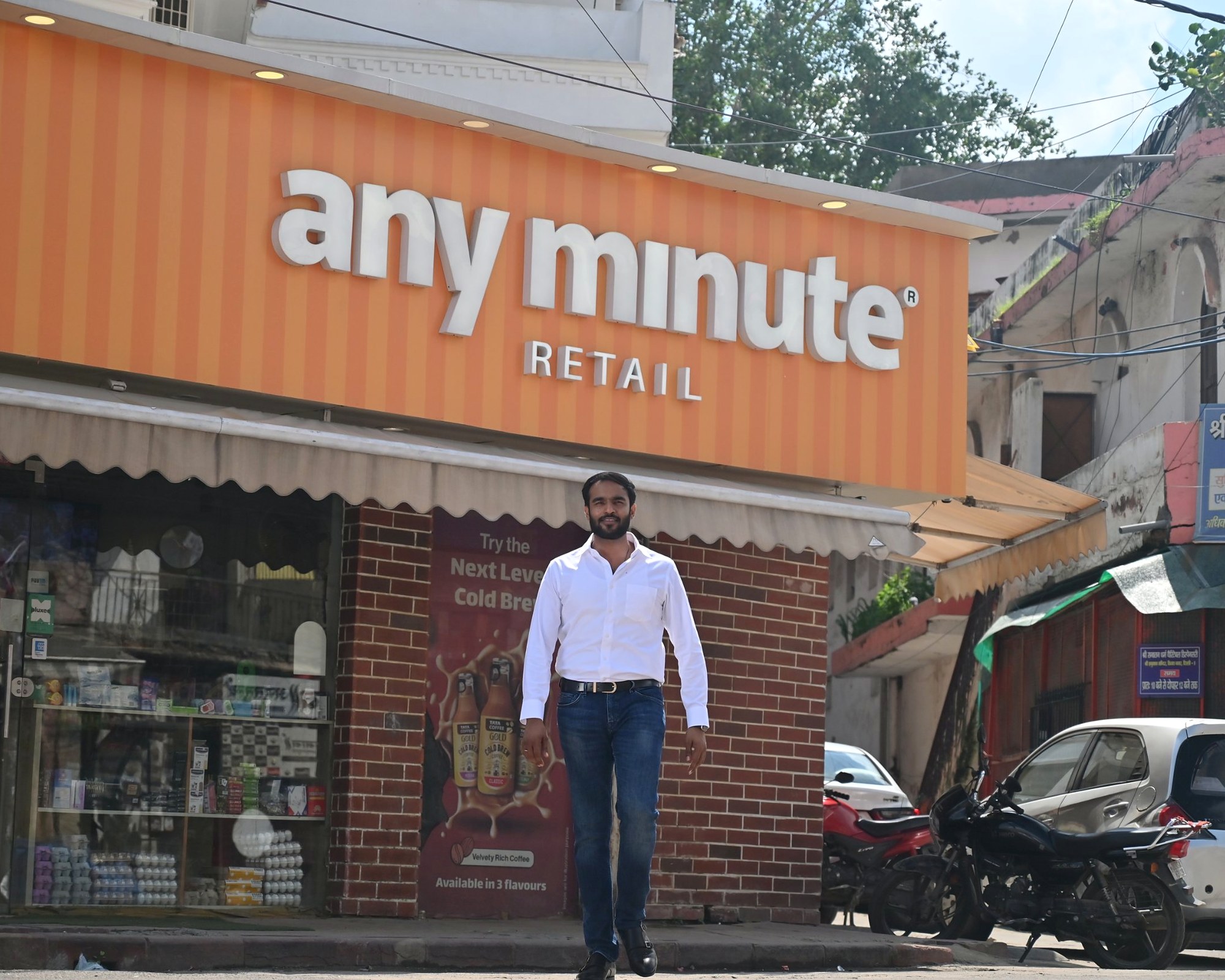 Neetesh Jain, founder of Any Minute Retail, in front of the store in Delhi